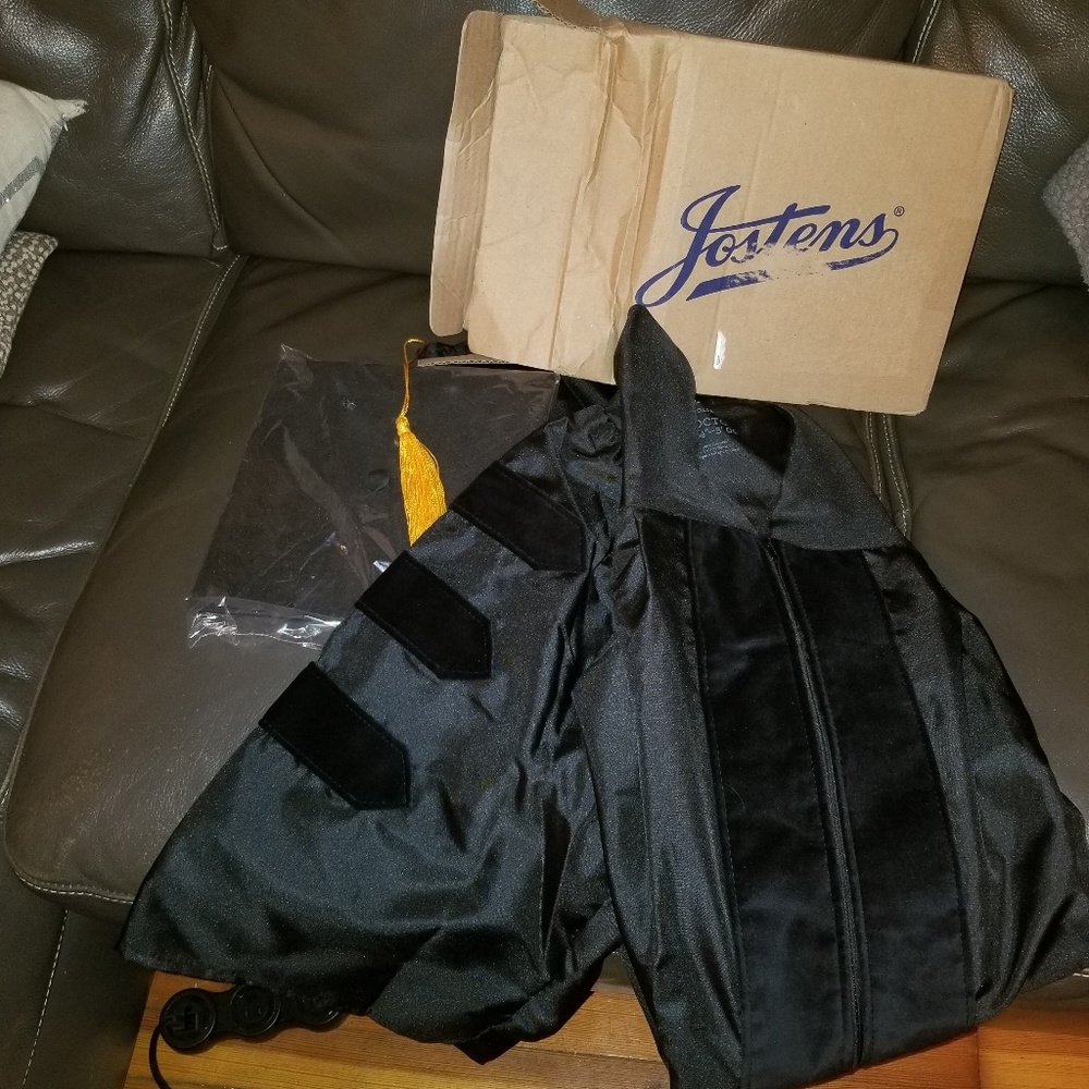 Jostens PhD regalia with cap and tassel